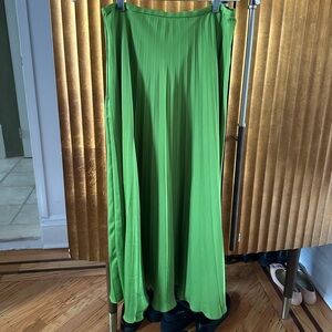 Pleated green satin midi skirt